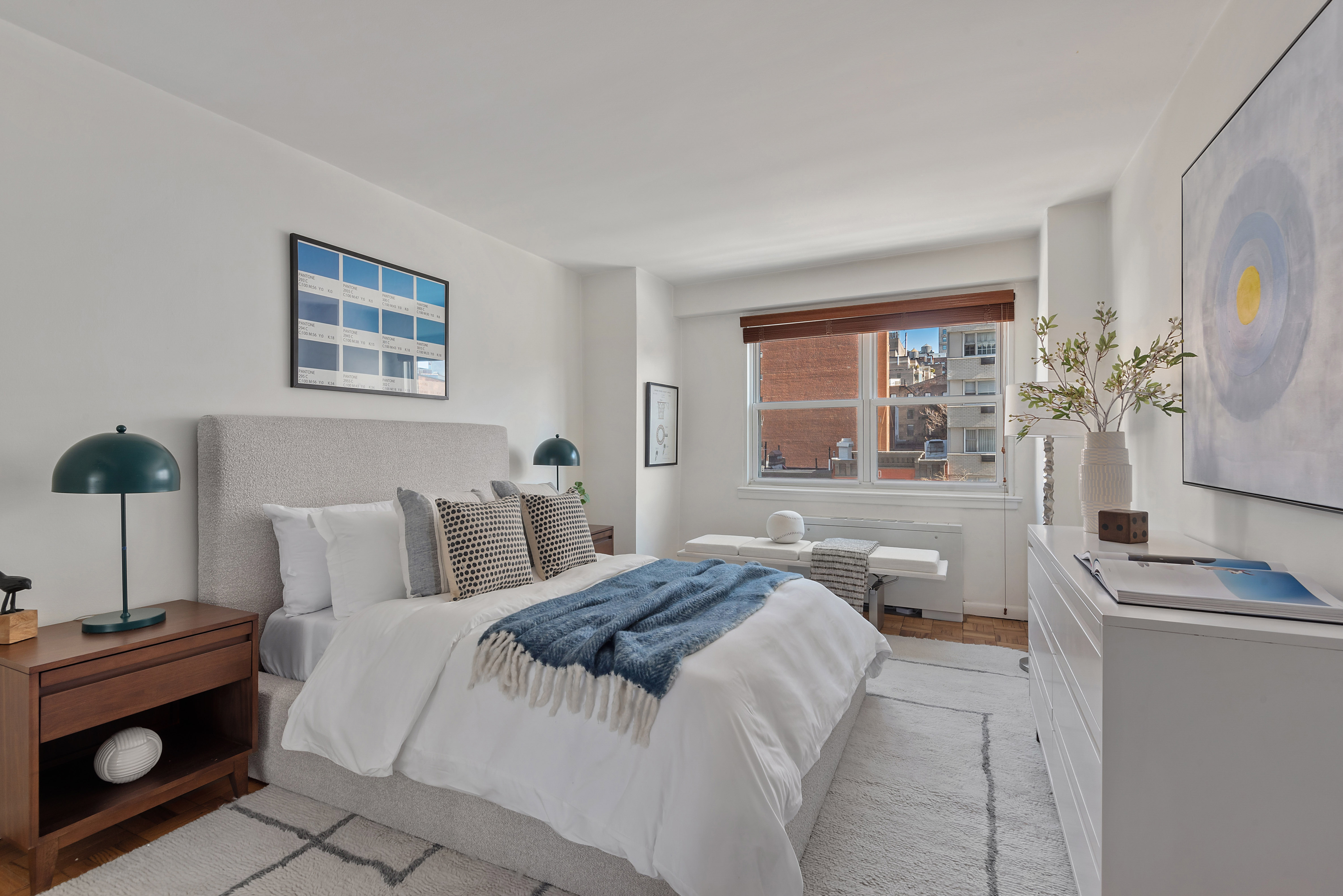 101 West 12th Street, Unit 6MN Manhattan, NY 10011 - Photo 5 of 17 a bedroom with a bed and a window