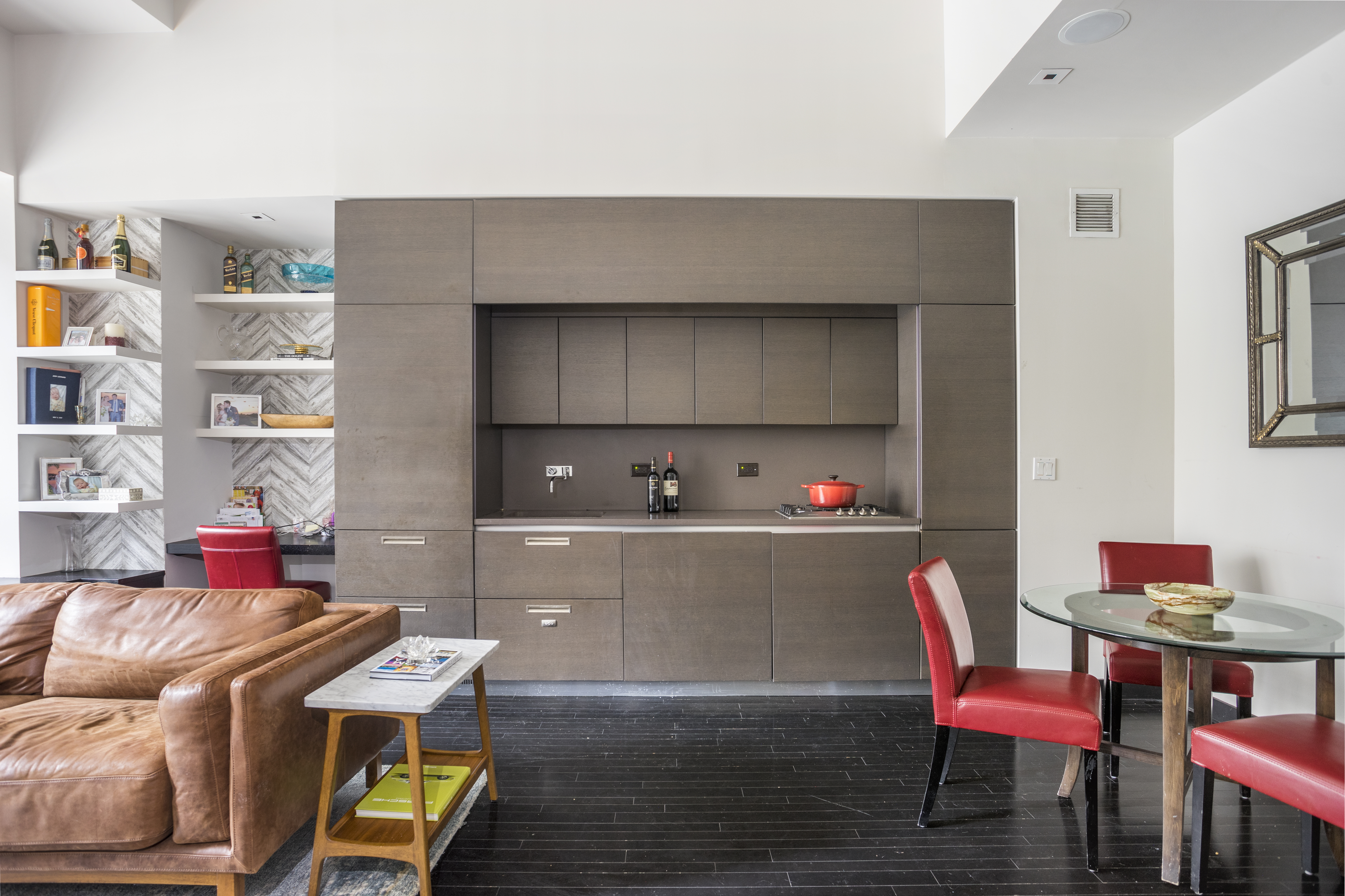 20 Pine Street, Unit 409 Manhattan, NY 10005 - Photo 1 of 11 a living room with furniture and a wooden floor