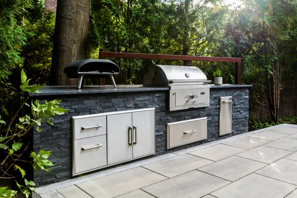 a kitchen with a sink and a stove