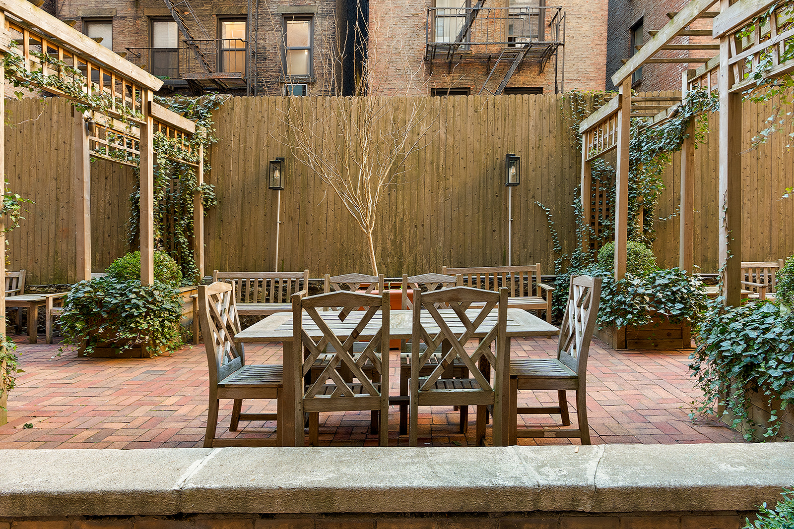 151 East 83rd Street, Unit PHC Manhattan, NY 10028 - Photo 15 of 16 a view of a chairs and bench in the patio