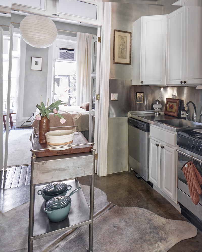 126 Washington Place, Unit 2 Manhattan, NY 10014 - Photo 10 of 14 a kitchen with stainless steel appliances granite countertop a stove and a sink