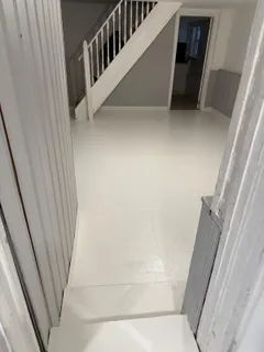 a view of staircase with white door