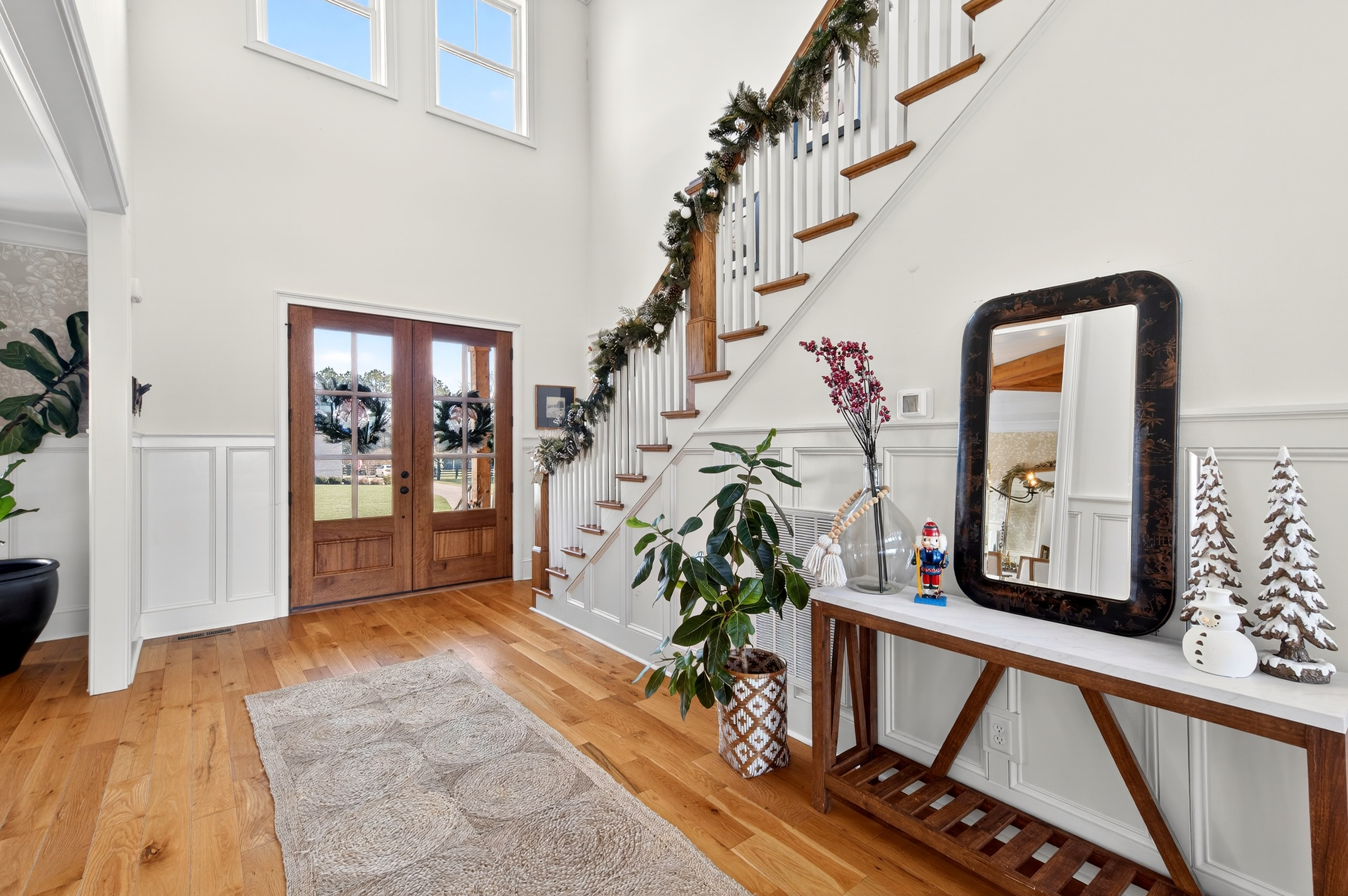 1703 Swansons Rdg Drive Franklin, TN 37064 - Photo 8 of 67 a view of an entryway with wooden floor