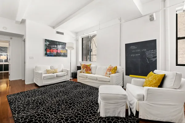 a living room with furniture and a couch