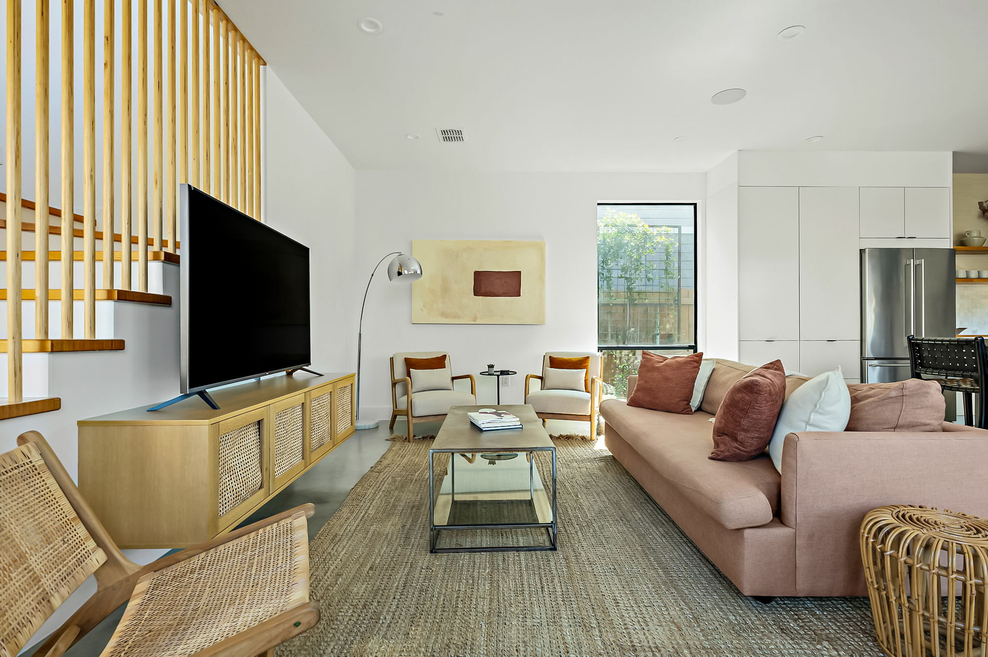 2201 Santa Rosa Street Austin, TX 78702 - Photo 6 of 47 a living room with furniture and a flat screen tv