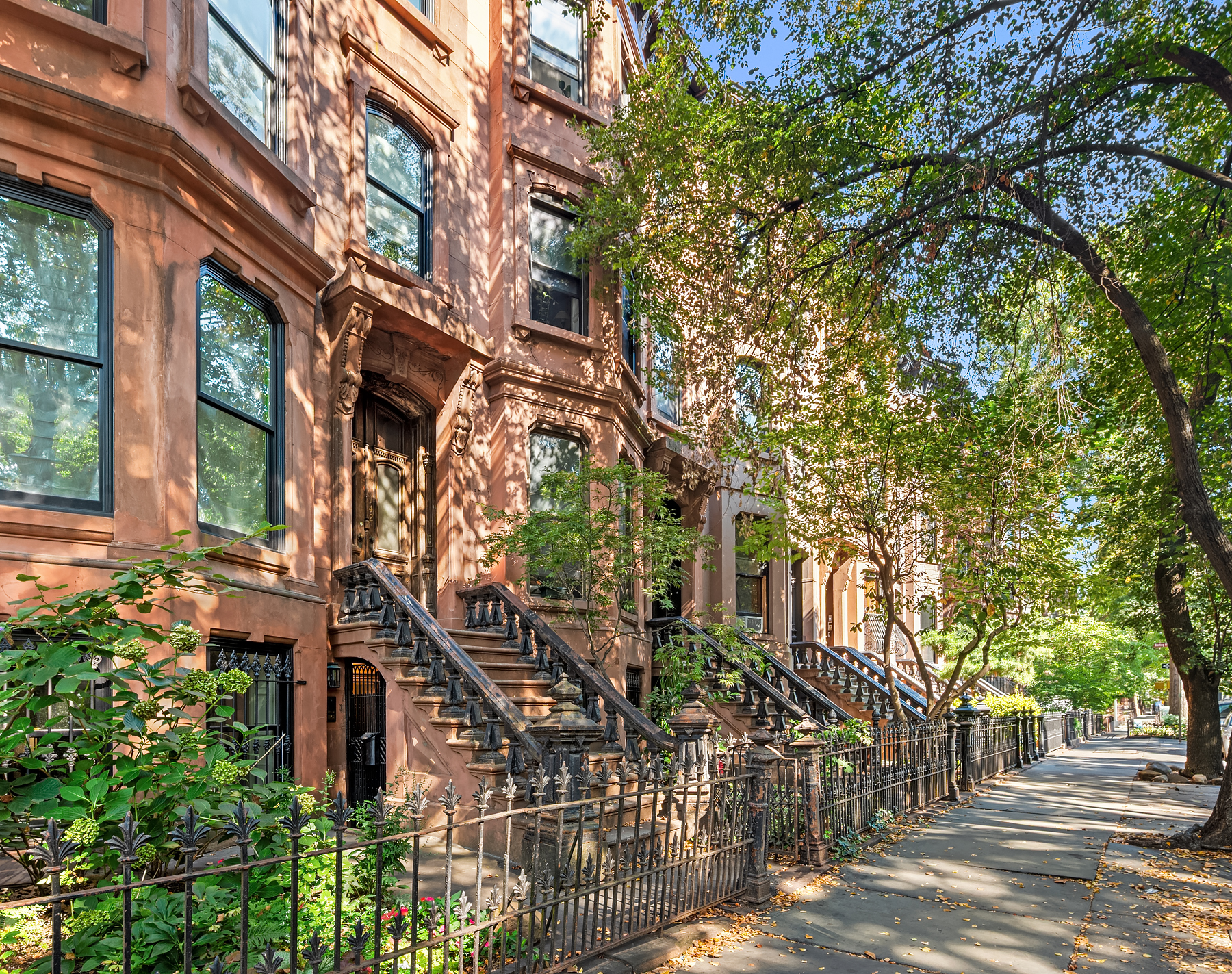 142 6th Avenue, Unit 1 Brooklyn, NY 11217 - Photo 9 of 14 a front view of a house with a tree