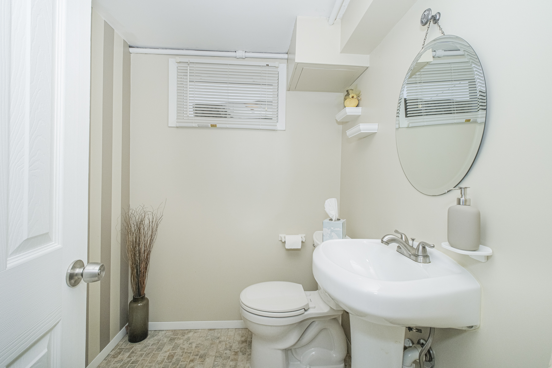 503 Falcon Avenue Staten Island, NY 10306 - Photo 25 of 30 a bathroom with a sink toilet and a mirror