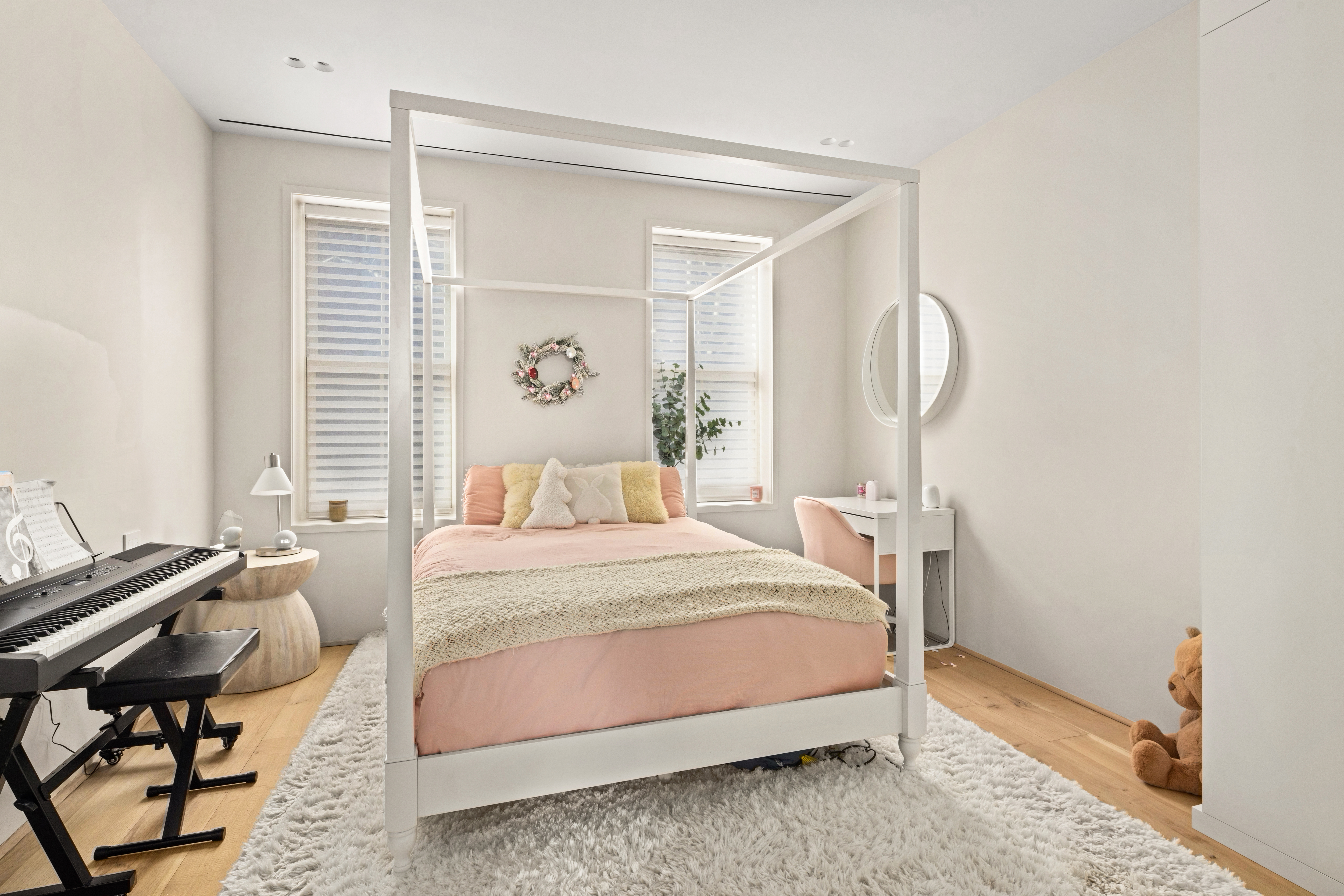 159 Hoyt Street Brooklyn, NY 11217 - Photo 10 of 18 a bedroom with a bed and wooden floor