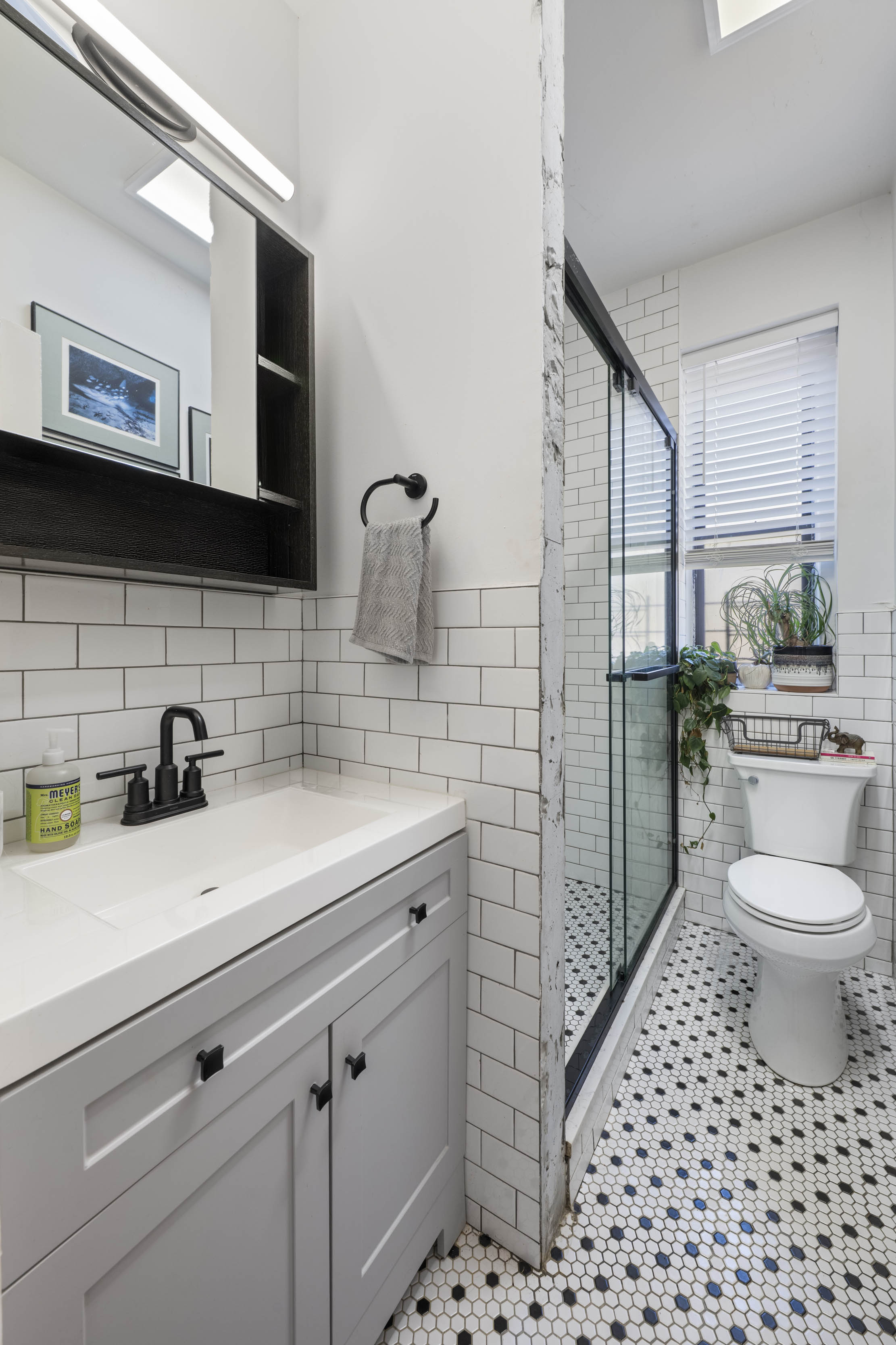 2199 Holland Avenue, Unit 5P Bronx, NY 10462 - Photo 9 of 11 a bathroom with a sink a toilet and shower