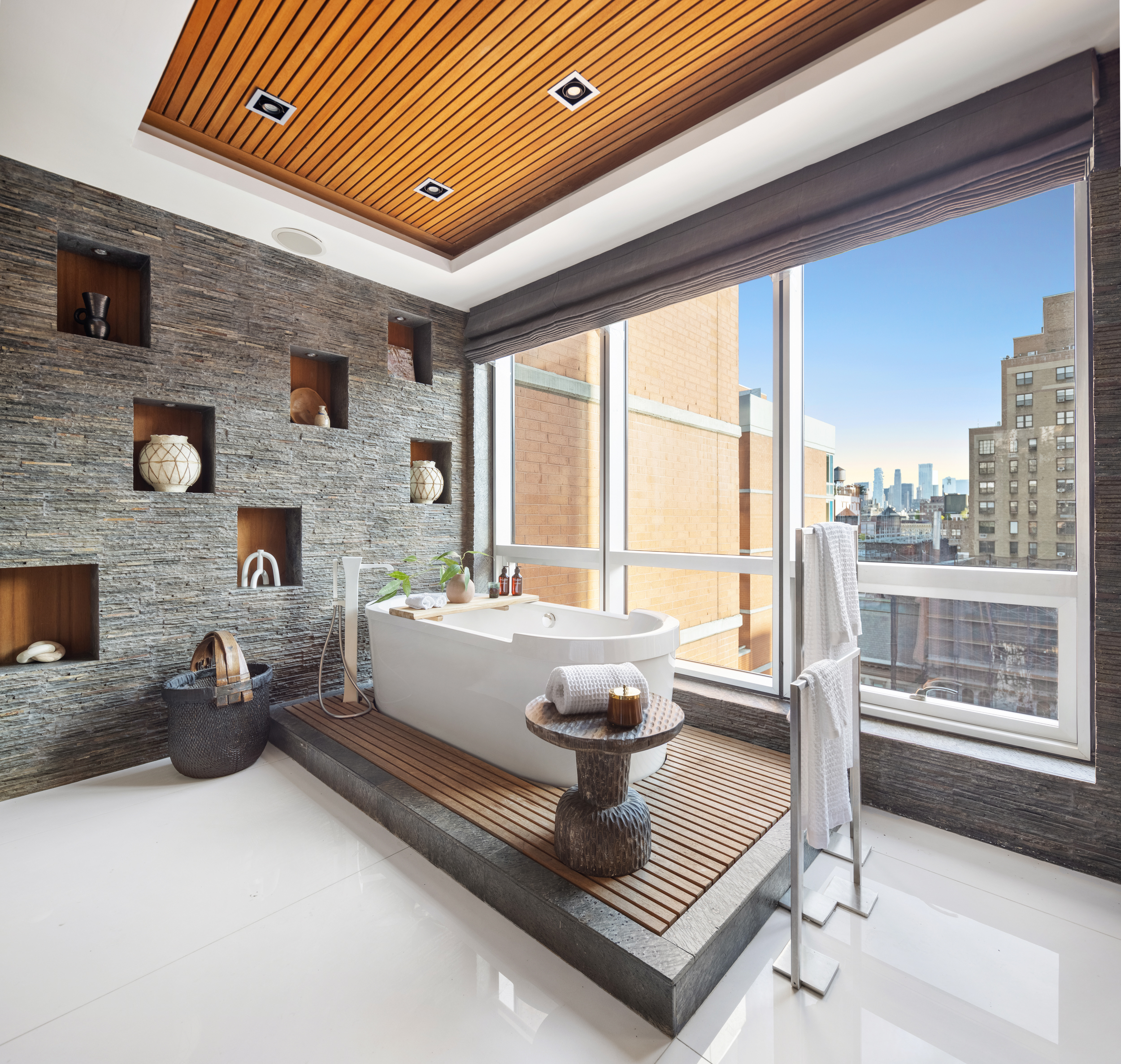 166 West 18th Street, Unit PH11 Manhattan, NY 10011 - Photo 7 of 16 a living room with furniture and a fireplace