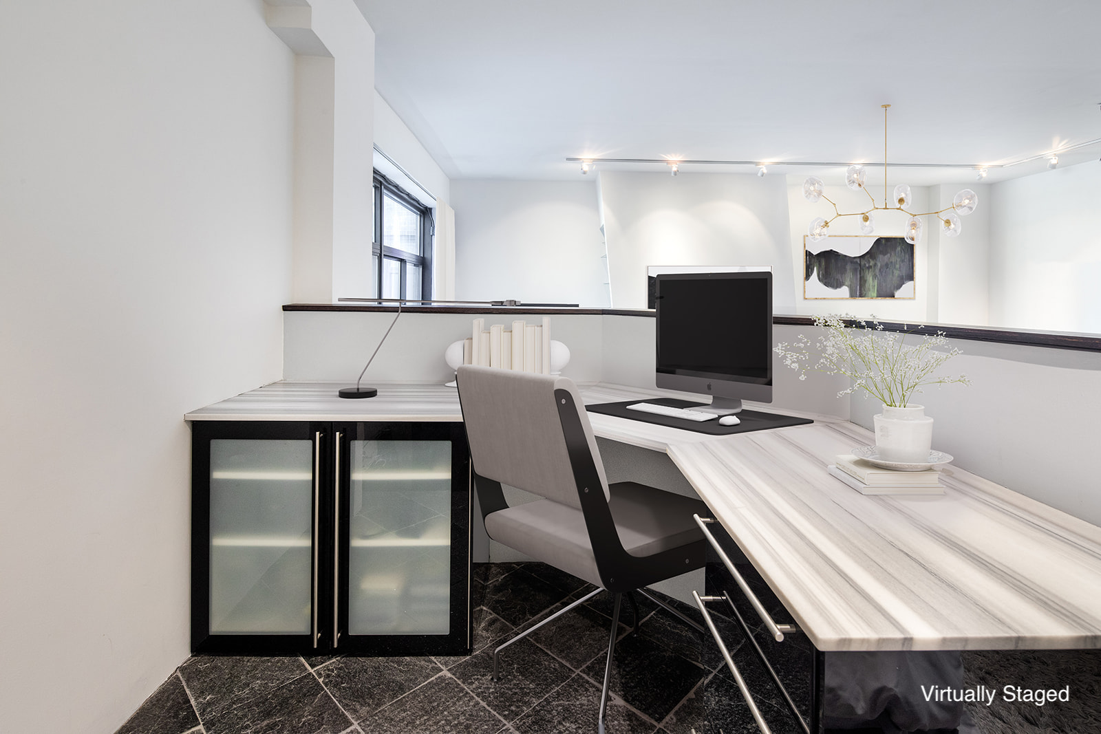 529 West 42nd Street, Unit 7N Manhattan, NY 10036 - Photo 5 of 12 a view of a workspace with furniture
