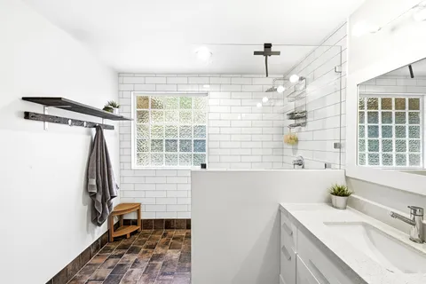 a bathroom with a sink and a bathtub