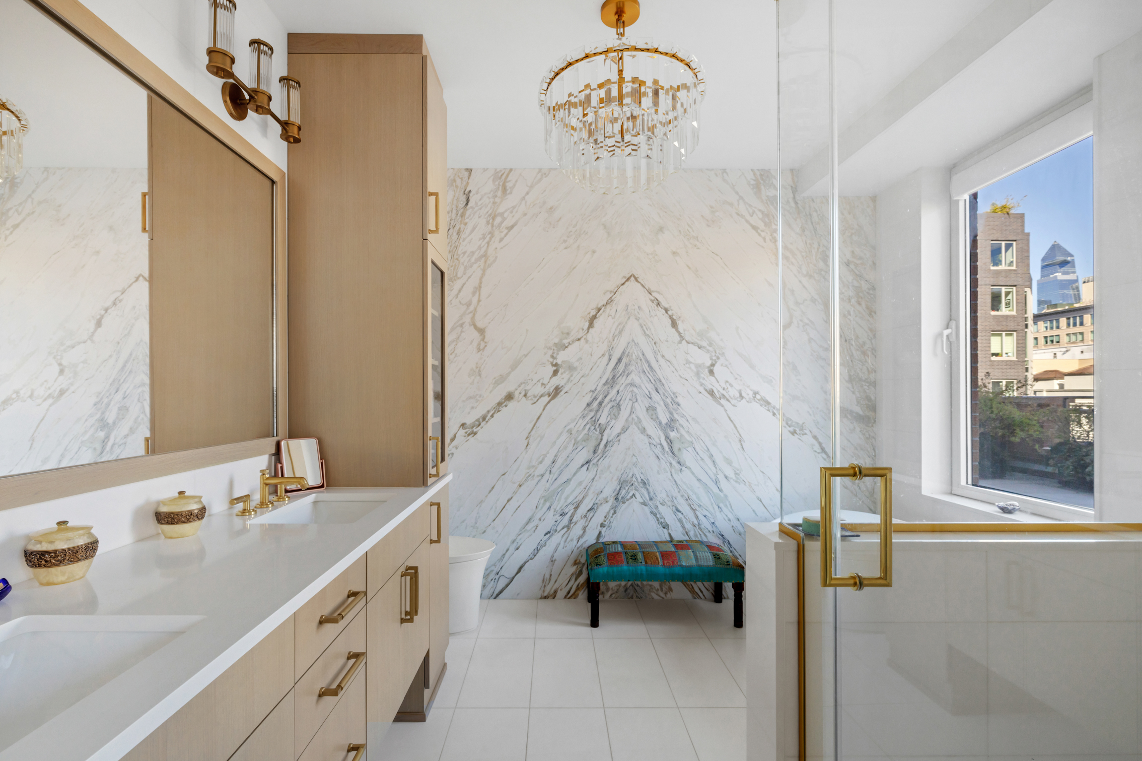 63 West 17th Street, Unit 7A Manhattan, NY 10011 - Photo 15 of 32 a bathroom with a sink and a mirror