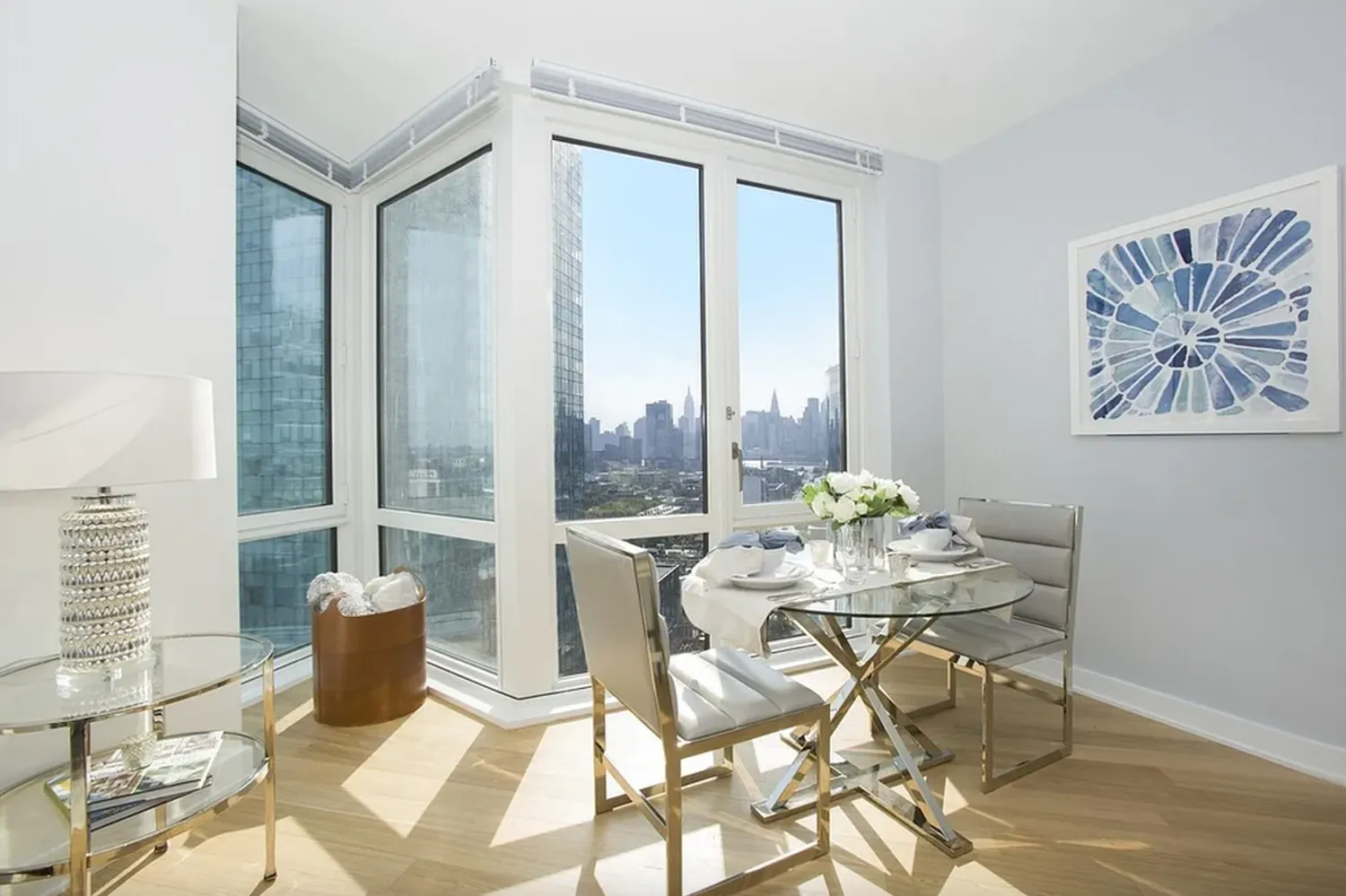a view of a dining room with furniture and window