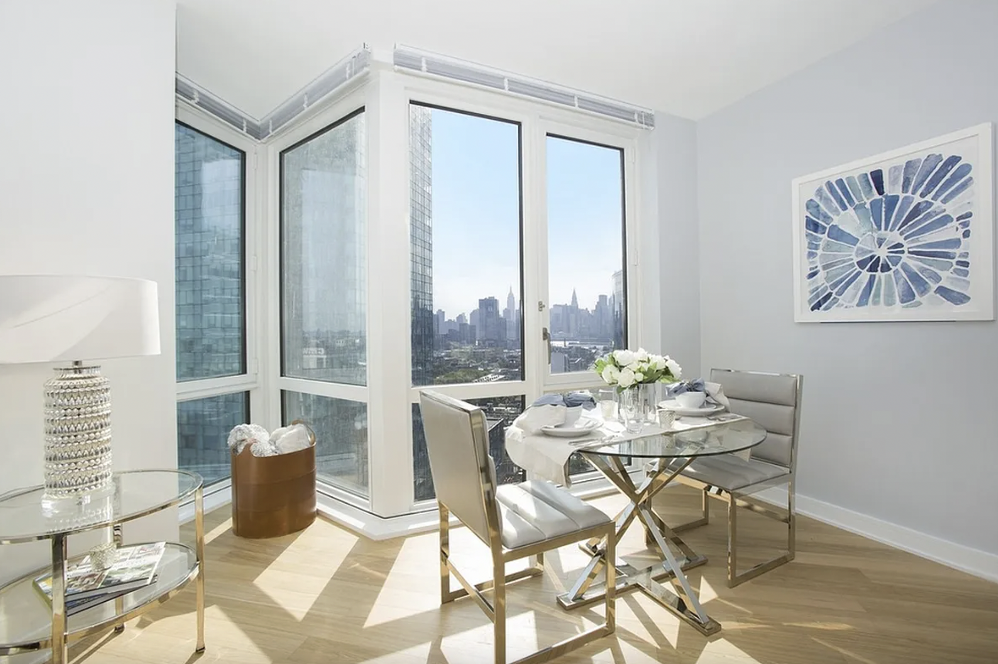 43-25 Hunter Street, Unit 4312W Queens, NY 11101 - Photo 5 of 16 a view of a dining room with furniture and window