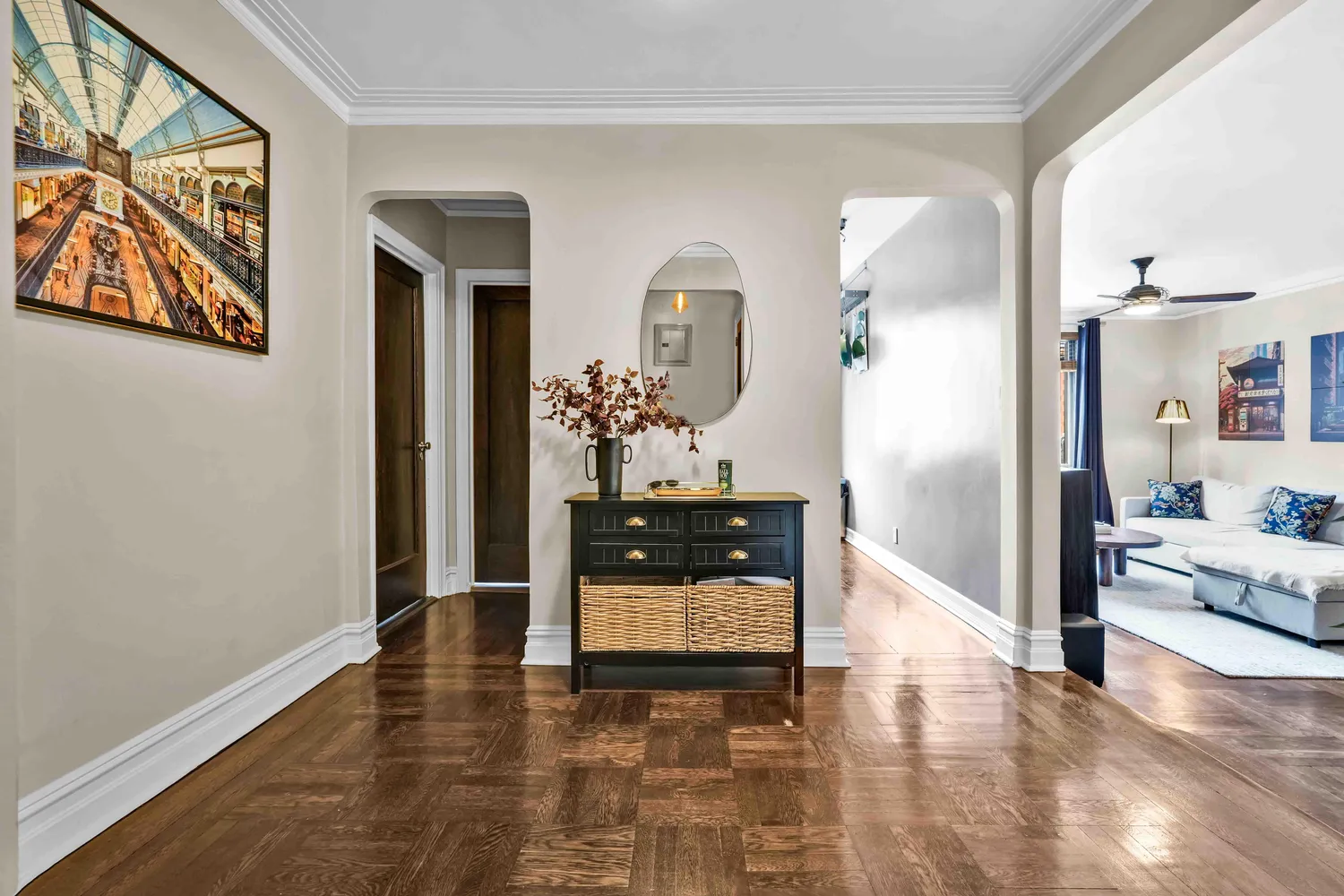 a view of a hallway with a living room