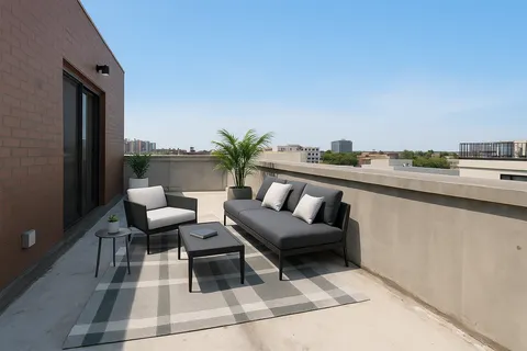 a outdoor space with patio couch and outdoor view