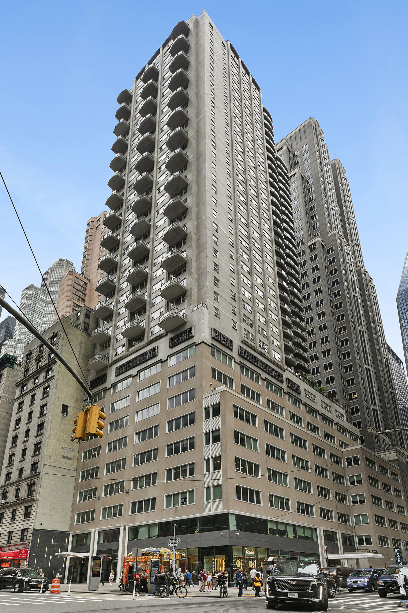 159 West 53rd Street, Unit 11D Manhattan, NY 10019 - Photo 8 of 9 a front view of a building