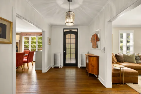 a view of livingroom with furniture wooden floor and window