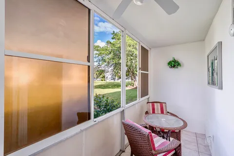 a room with furniture and a window