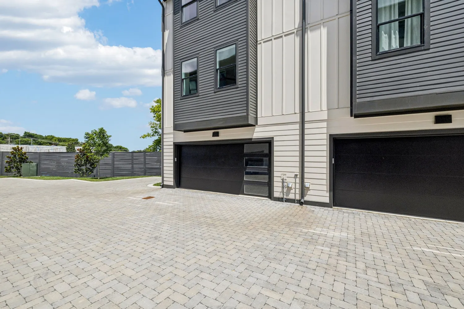 a view of a house with a garage