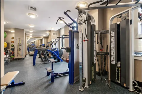 a view of a room with gym equipment