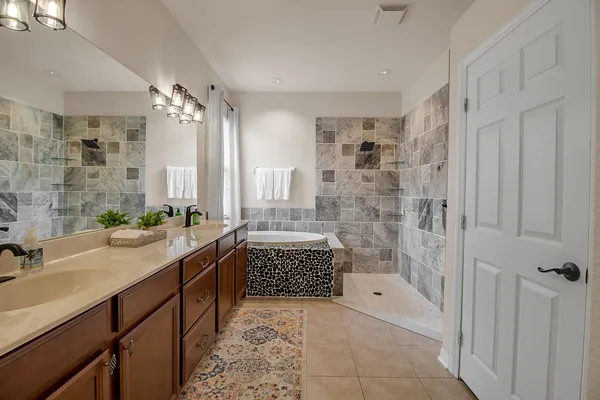 a bathroom with a bath tub