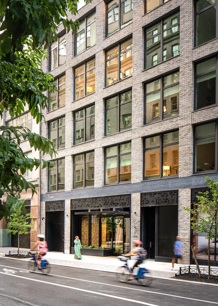 77 Charlton Street, Unit S10A Manhattan, NY 10014 - Photo 25 of 27 a view of a building and a street