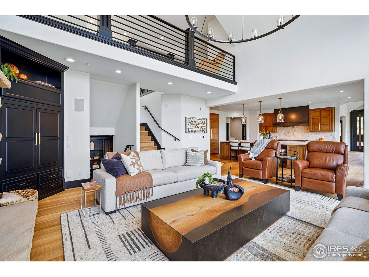 166 Valley View Way Boulder, CO 80304 - Photo 12 of 40 a living room with furniture and a flat screen tv