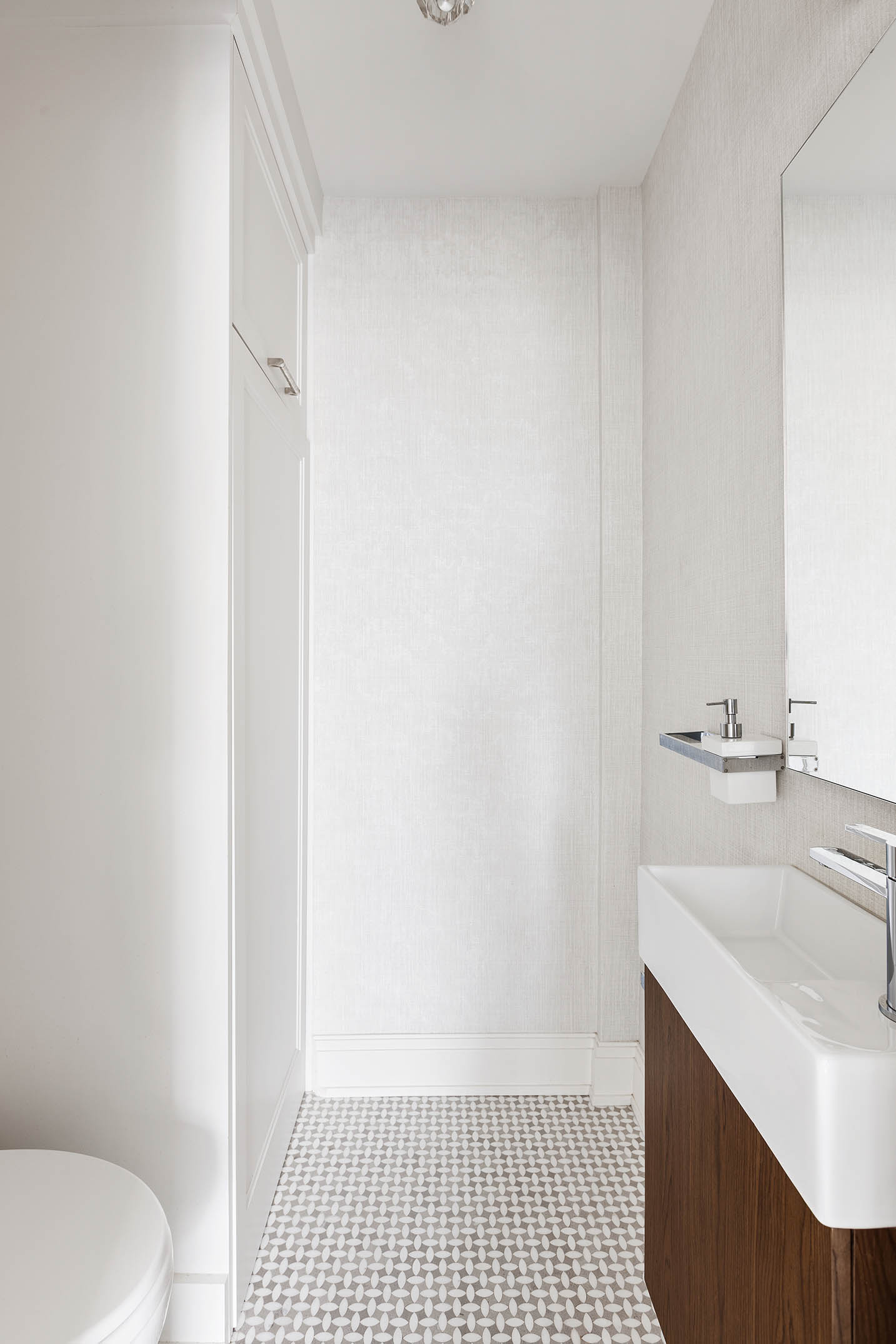 49 East 86th Street, Unit 17B Manhattan, NY 10028 - Photo 9 of 11 a bathroom with a sink toilet and shower