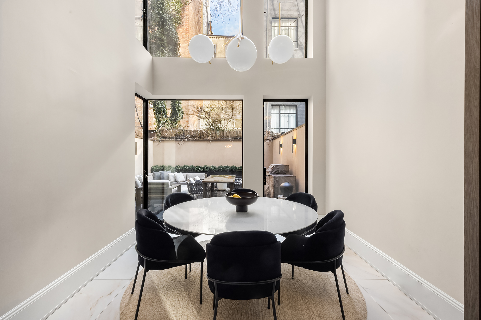 123 East 61st Street Manhattan, NY 10065 - Photo 24 of 31 a dining room with furniture and window