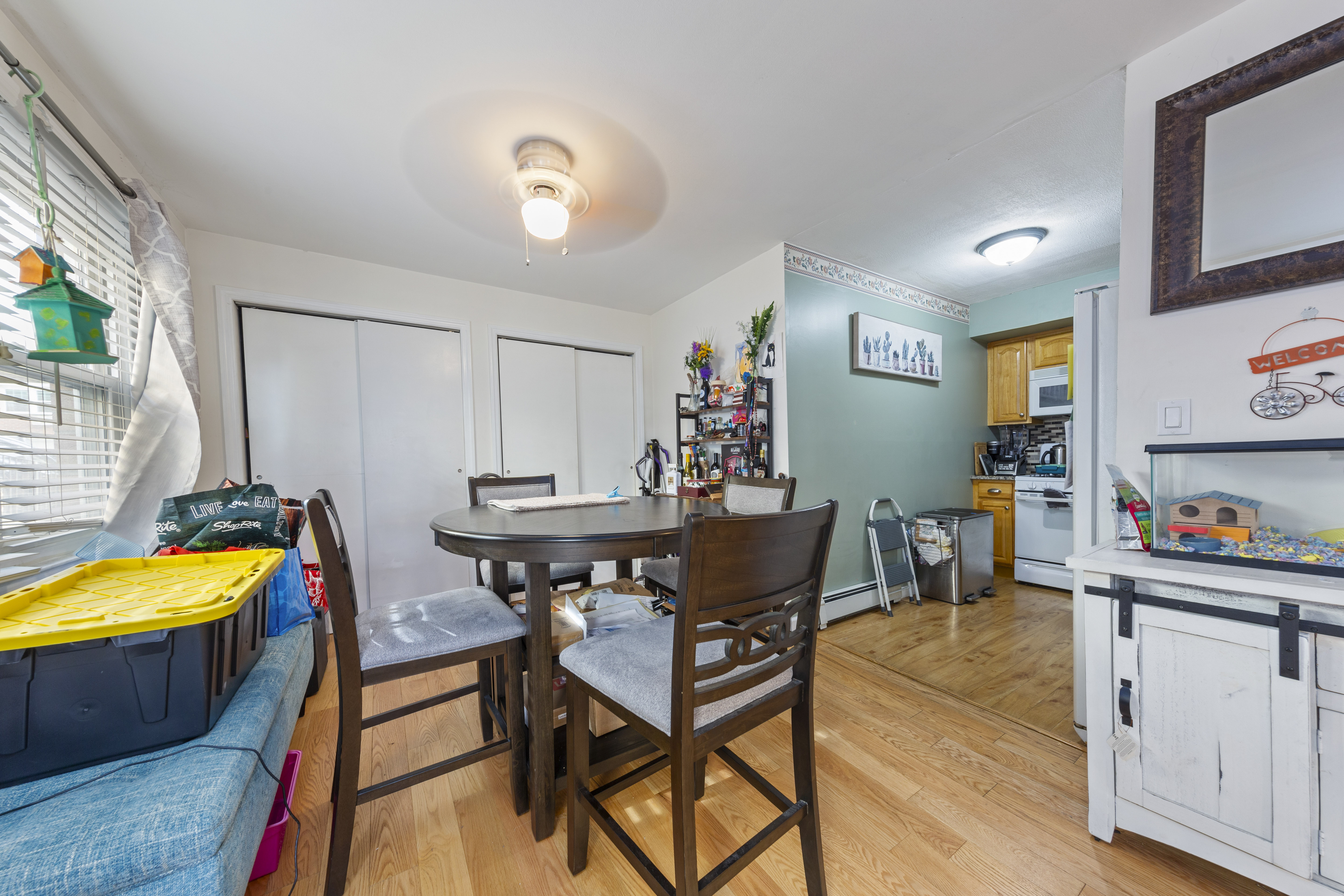 240-47 68th Avenue Queens, NY 11362 - Photo 18 of 39 a view of a dining room and kitchen
