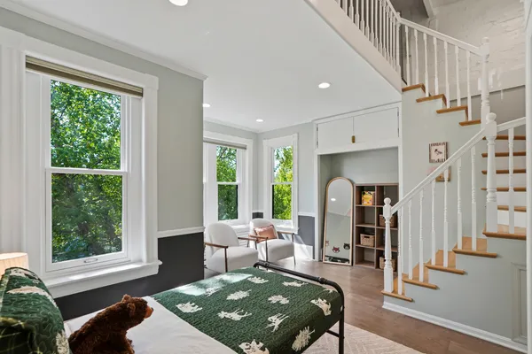 a living room with furniture and a rug
