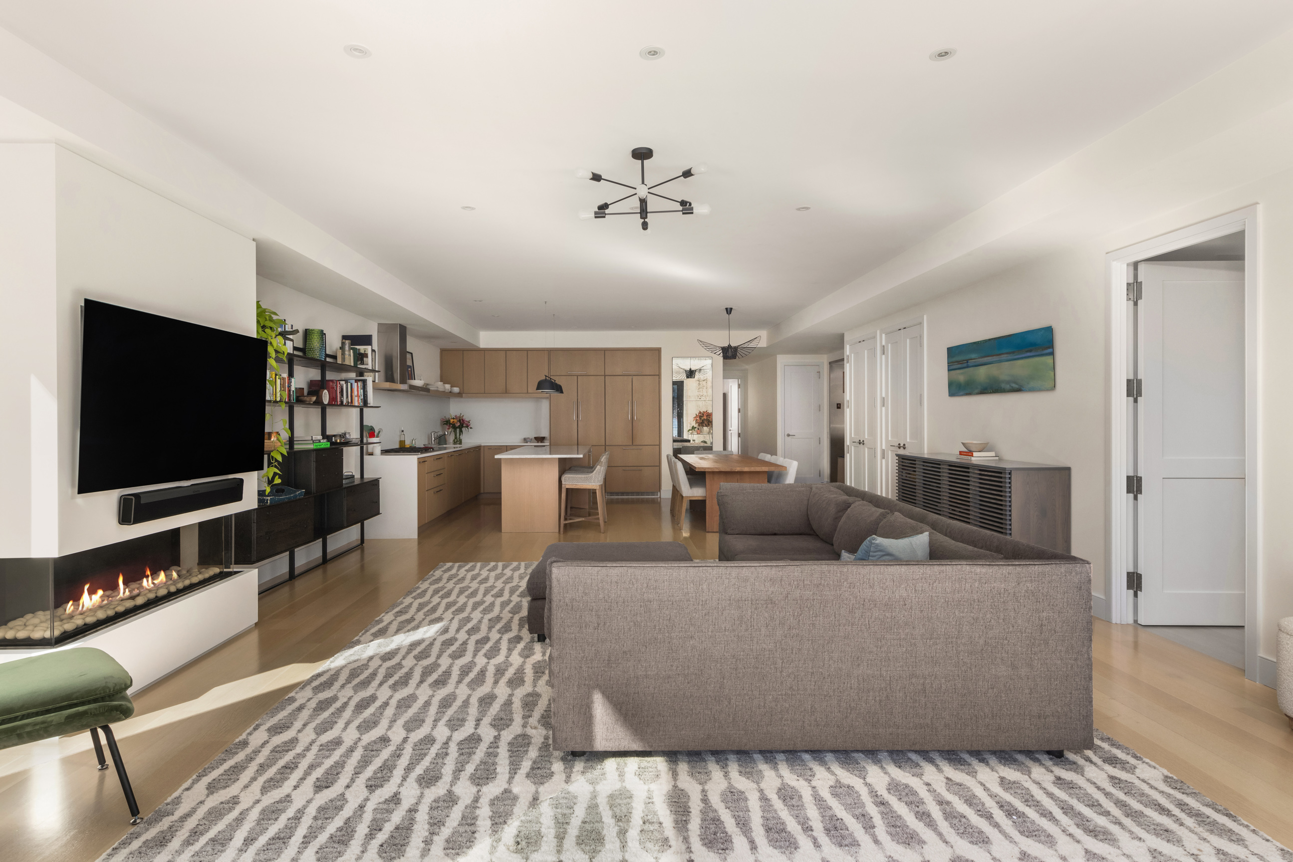 134 West 83rd Street, Unit 4 Manhattan, NY 10024 - Photo 5 of 17 a living room with furniture and a flat screen tv