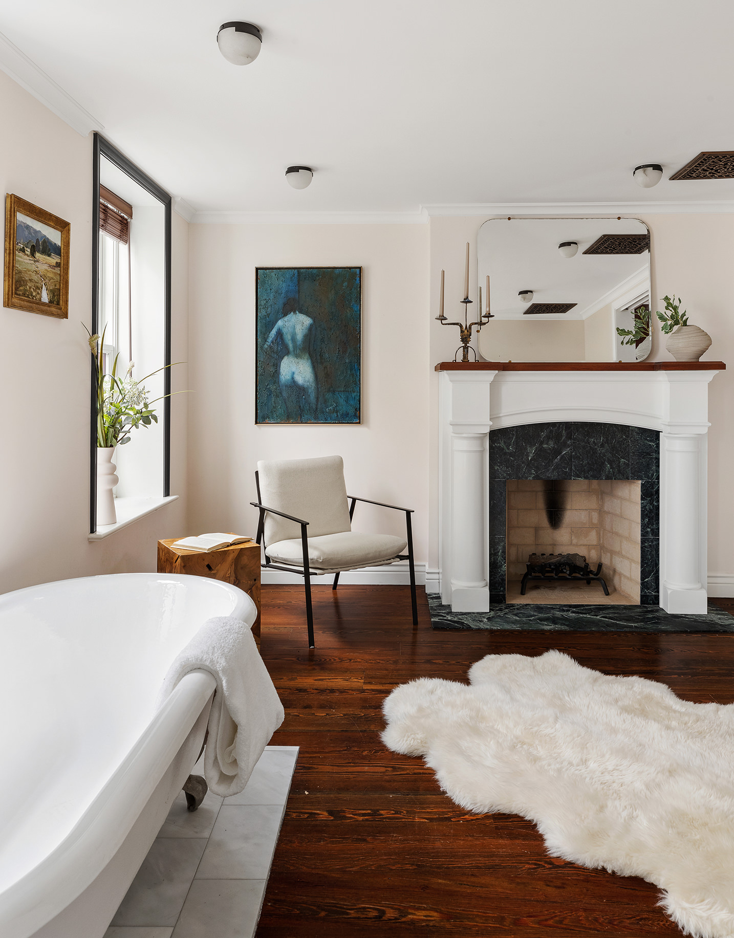 439 Sackett Street Brooklyn, NY 11231 - Photo 22 of 25 a bedroom with a bed and a fireplace