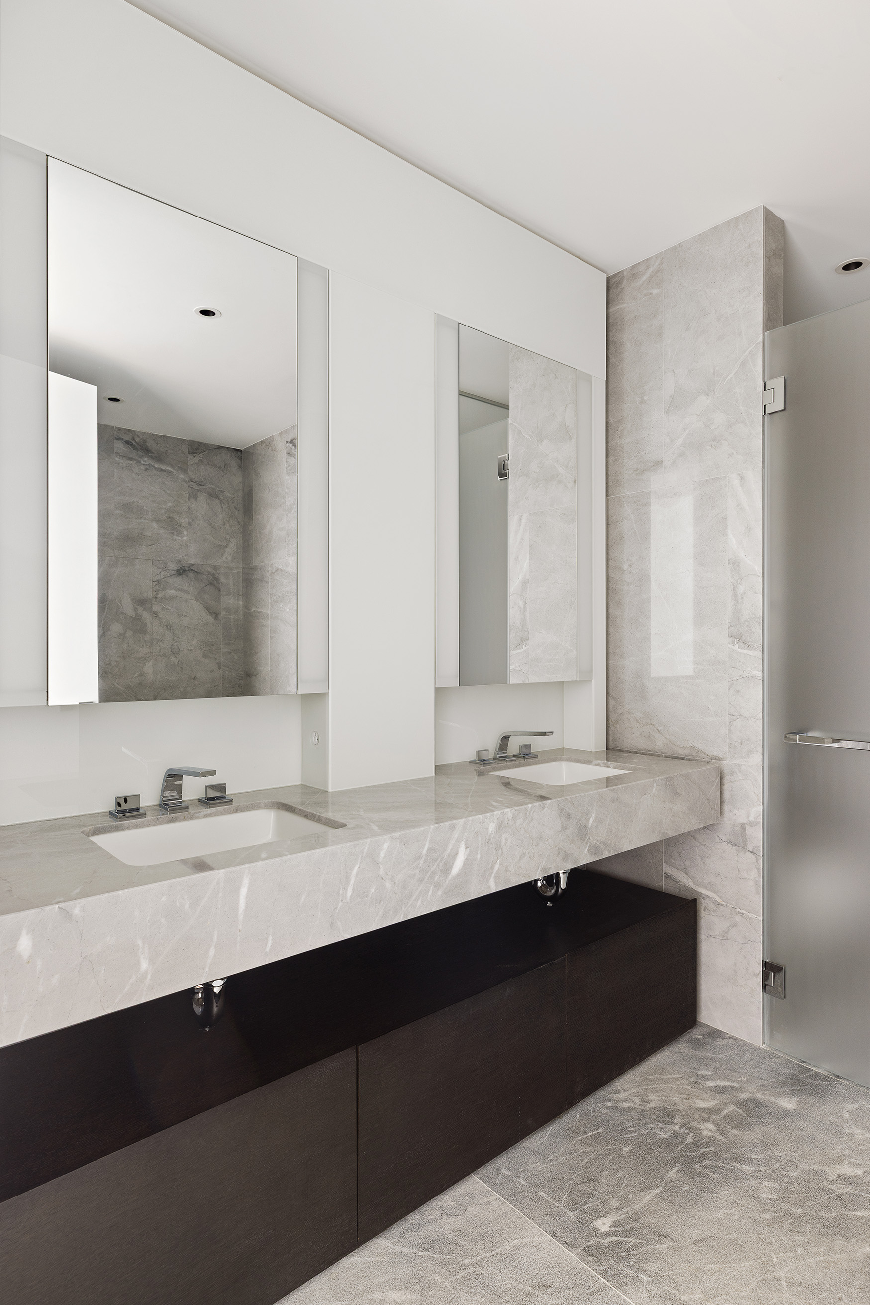 15 Hudson Yards, Unit 68C Manhattan, NY 10001 - Photo 10 of 16 a bathroom with a granite countertop sink and a mirror