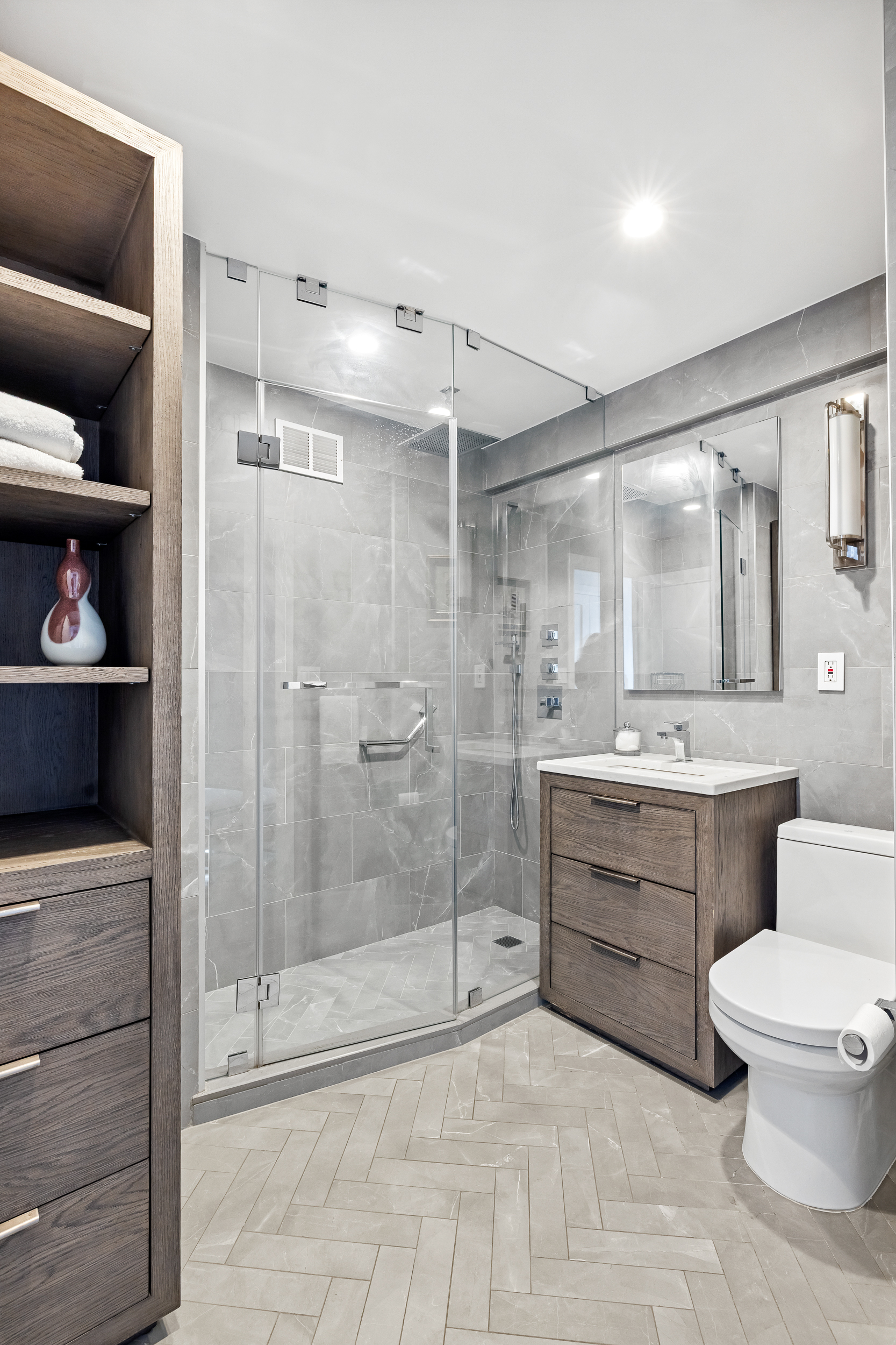 80 East End Avenue, Unit 17C Manhattan, NY 10028 - Photo 10 of 11 a bathroom with a sink a toilet and shower