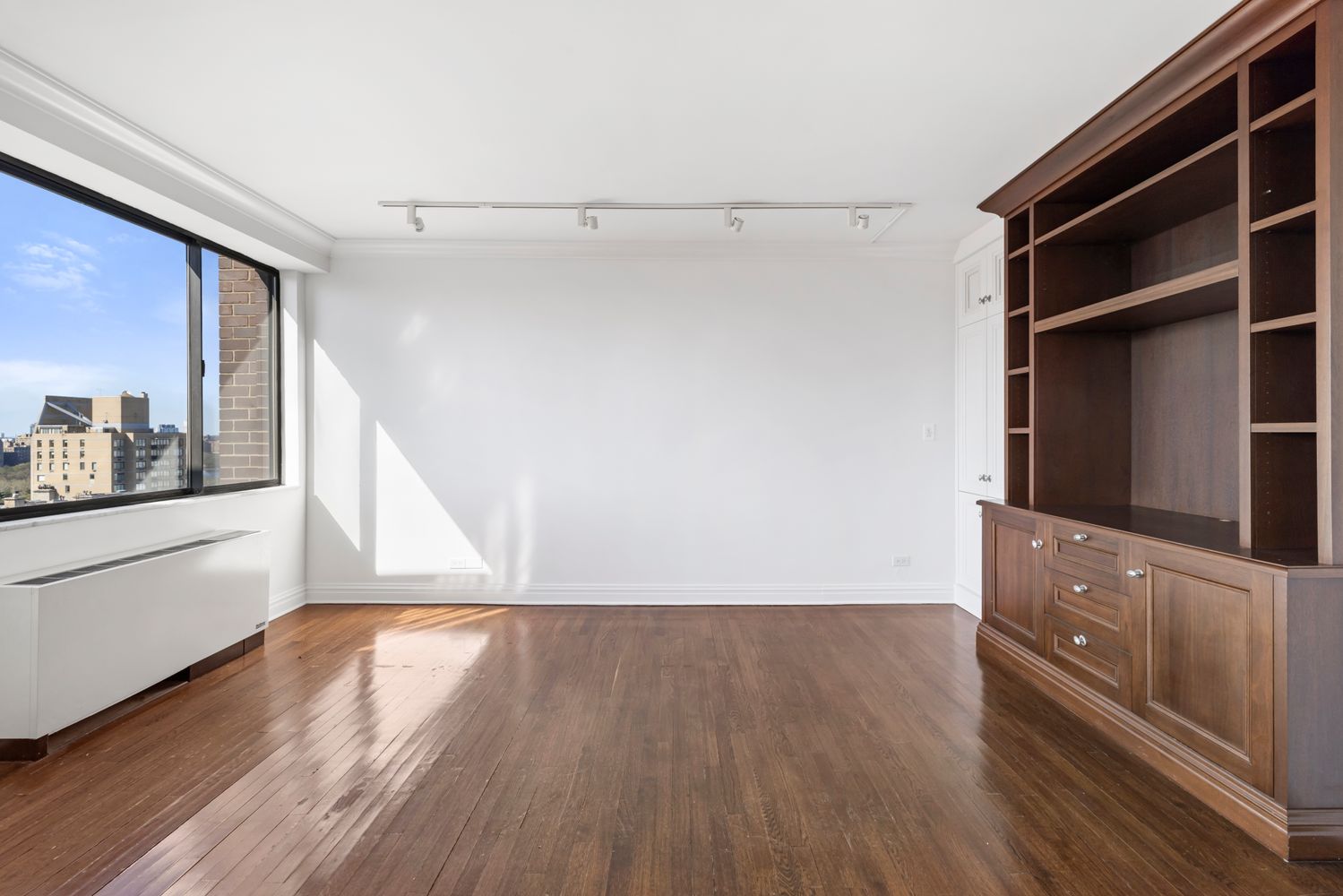 40 East 80th Street, Unit 25A Manhattan, NY 10075 - Photo 11 of 18 a view of walk in closet with empty racks
