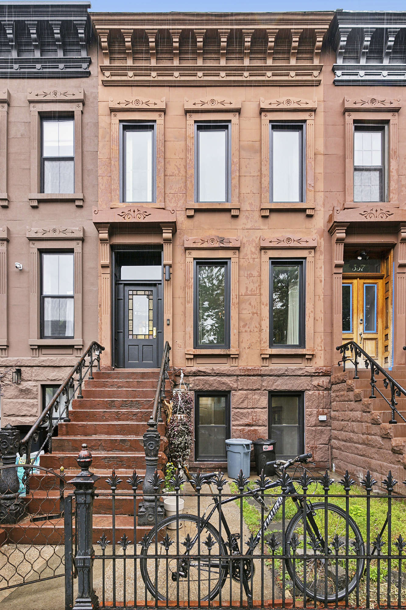 555 MacDonough Street, Unit 1 Brooklyn, NY 11233 - Photo 5 of 7 a view of a brick building with many windows