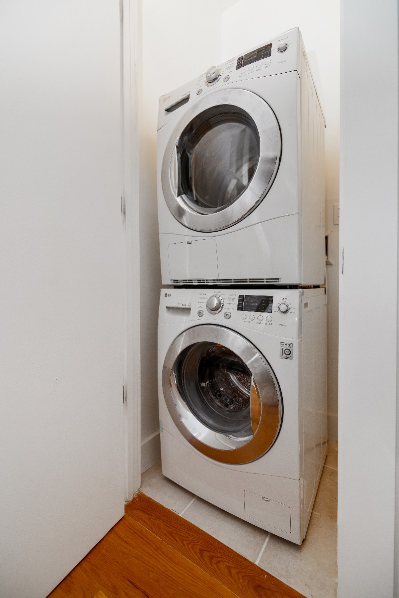 659 Bergen Street, Unit 3D Brooklyn, NY 11238 - Photo 5 of 7 a utility room with dryer and washer