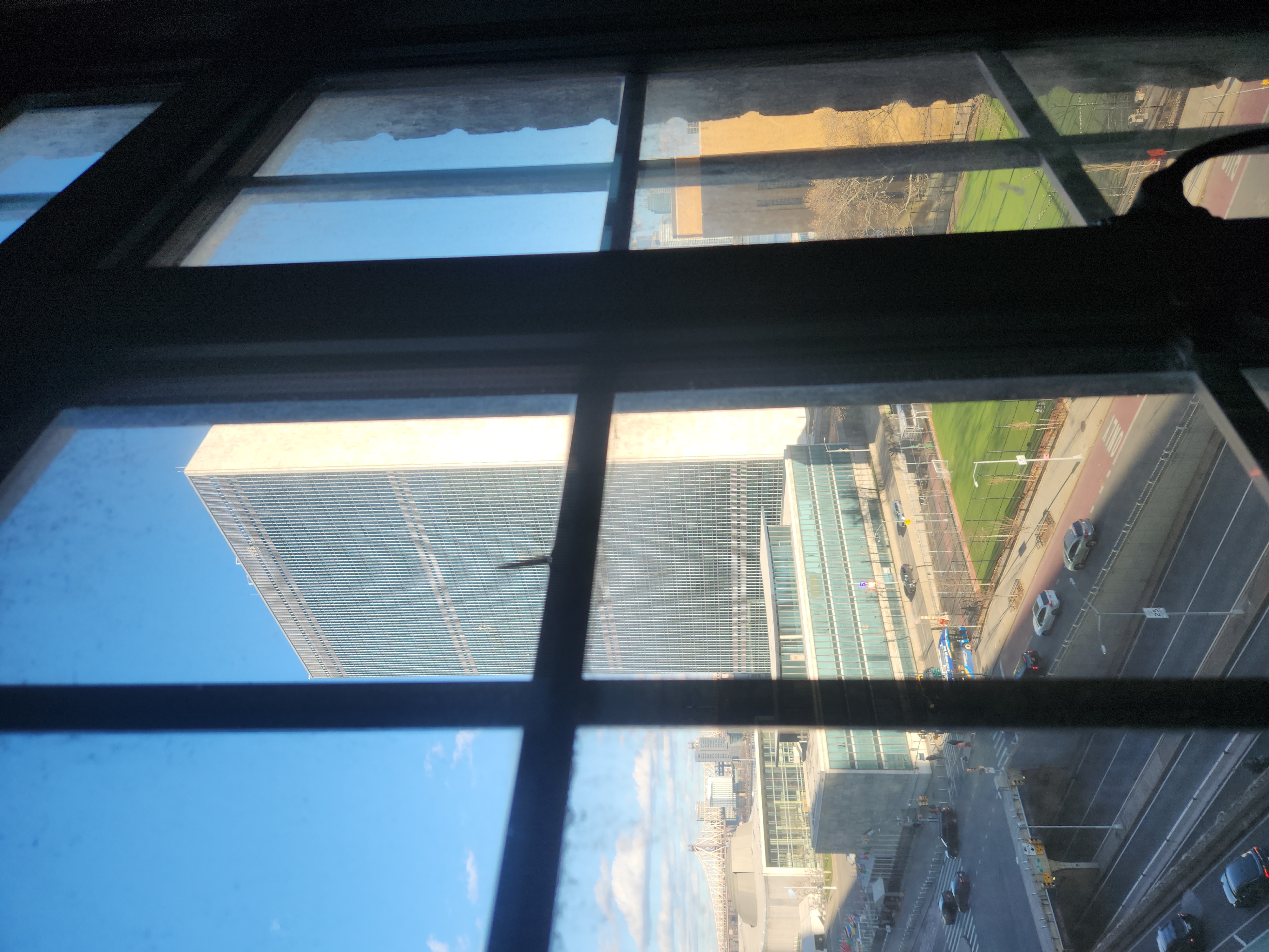 5 Tudor City Place, Unit 602 Manhattan, NY 10017 - Photo 8 of 20 a view of sky from window