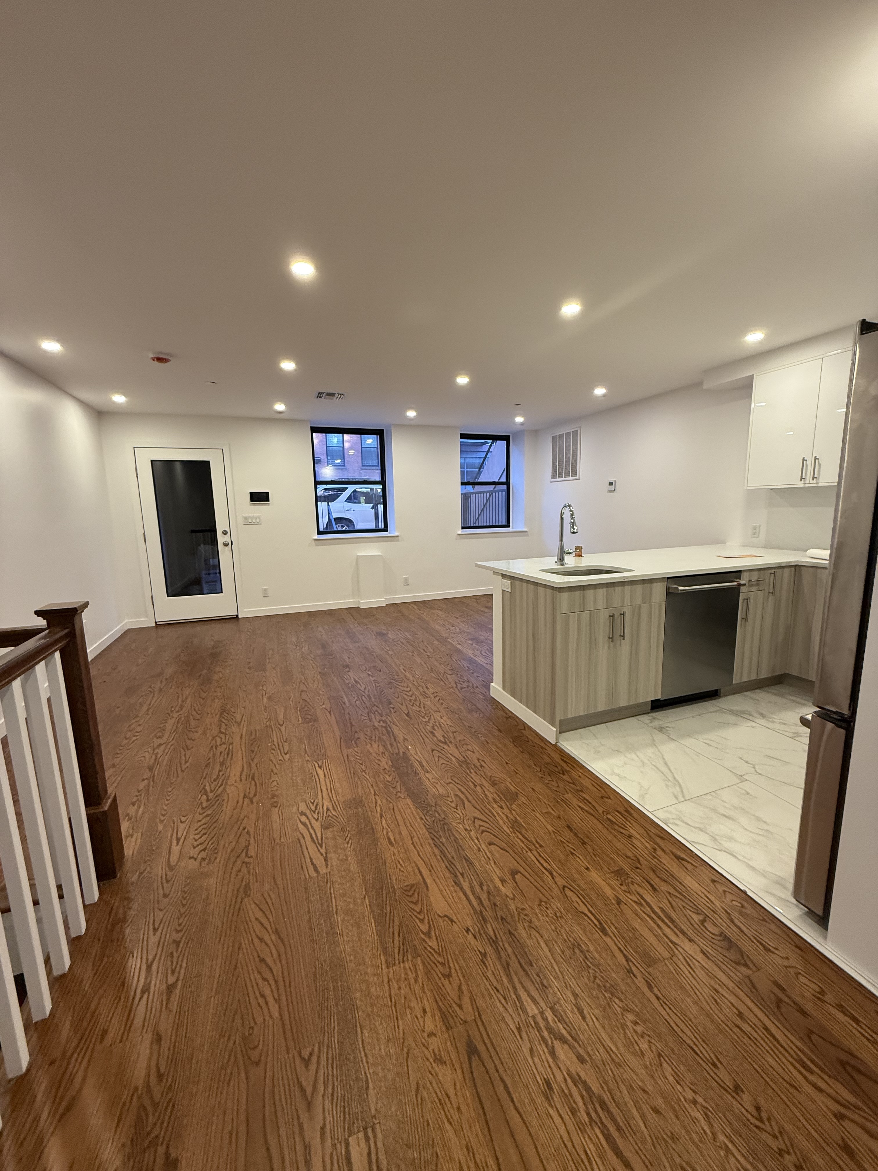 109 President Street, Unit 1 Brooklyn, NY 11231 - Photo 5 of 16 a view of kitchen with cabinets and wooden floor