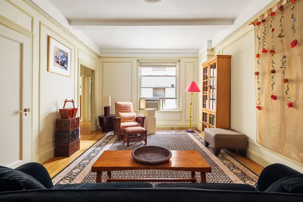 a room with furniture and window