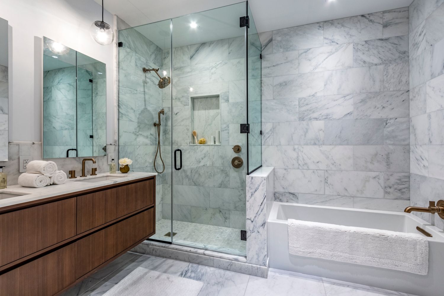 106 Franklin Street, Unit 2 Manhattan, NY 10013 - Photo 7 of 20 a bathroom with a bathtub shower sink and mirror