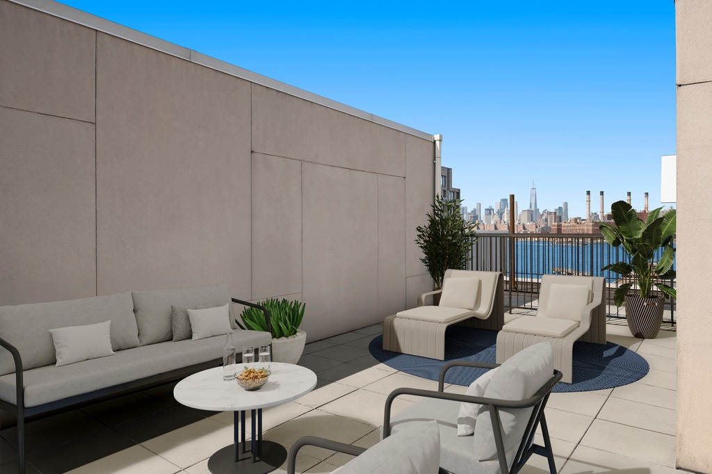 122 West Street, Unit PHA Brooklyn, NY 11222 - Photo 5 of 14 a view of a patio in the backyard