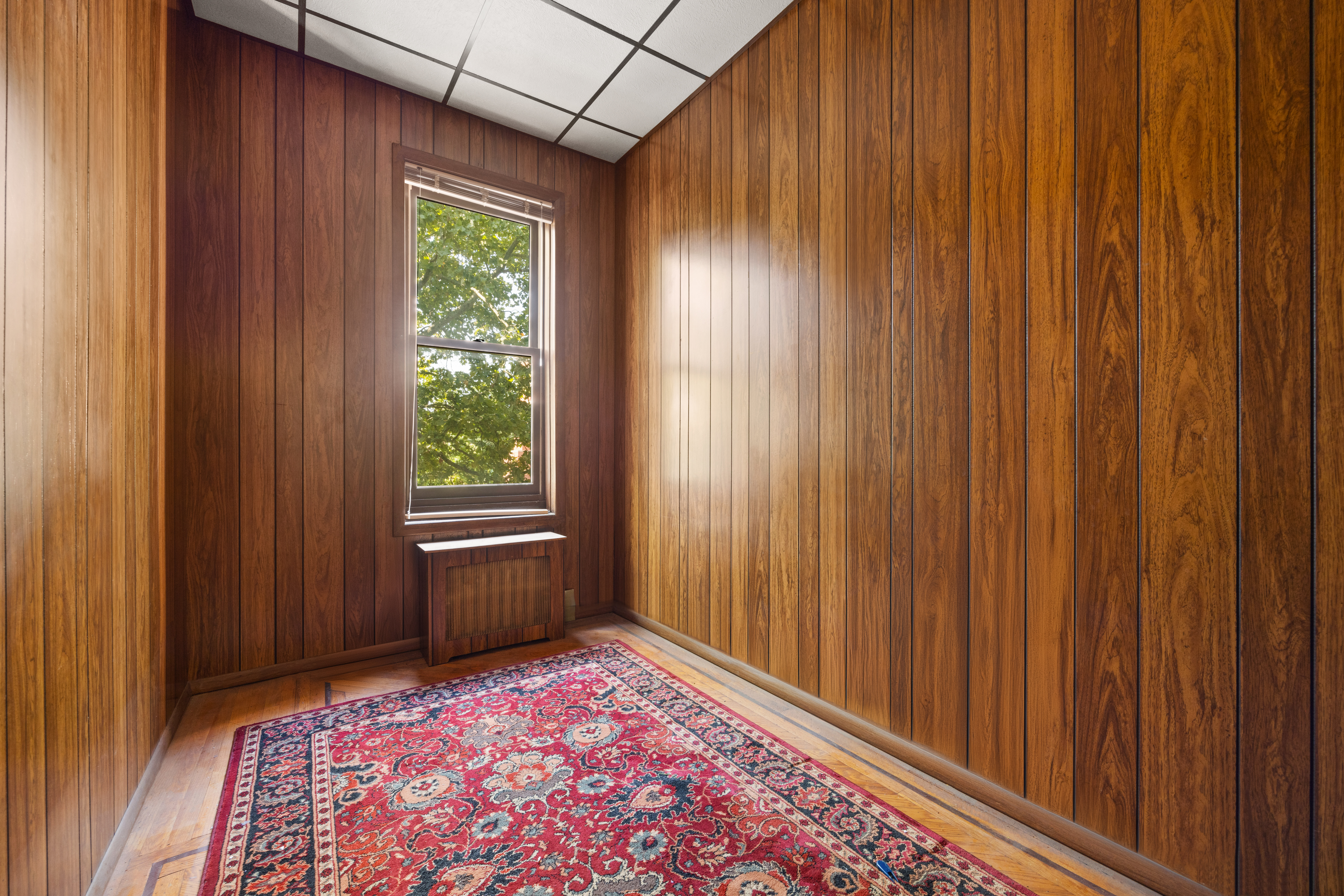 273 Windsor Place Brooklyn, NY 11218 - Photo 23 of 29 a view of an empty room with a window