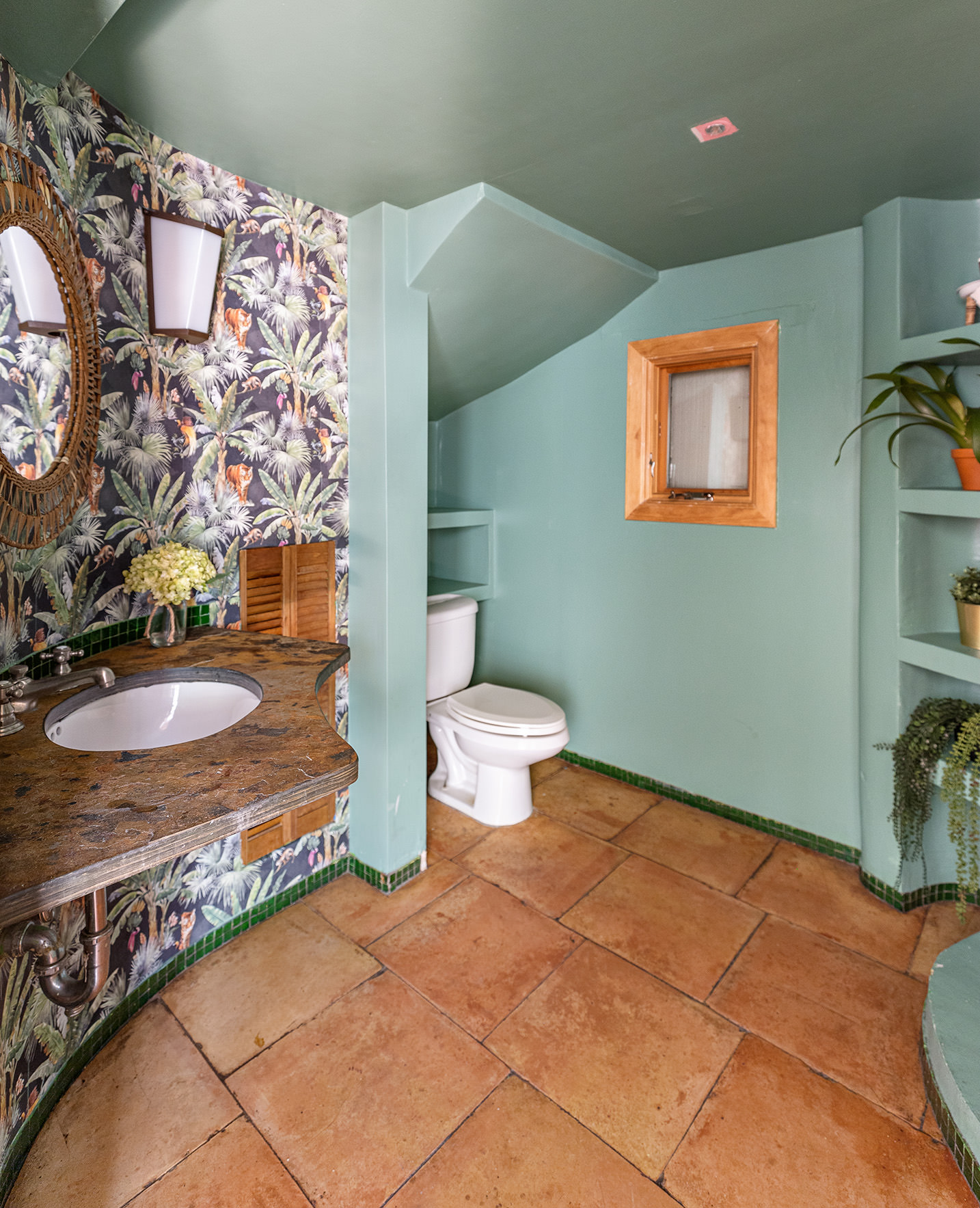 170 Eldridge Street Manhattan, NY 10002 - Photo 12 of 19 a bathroom with a toilet sink and mirror