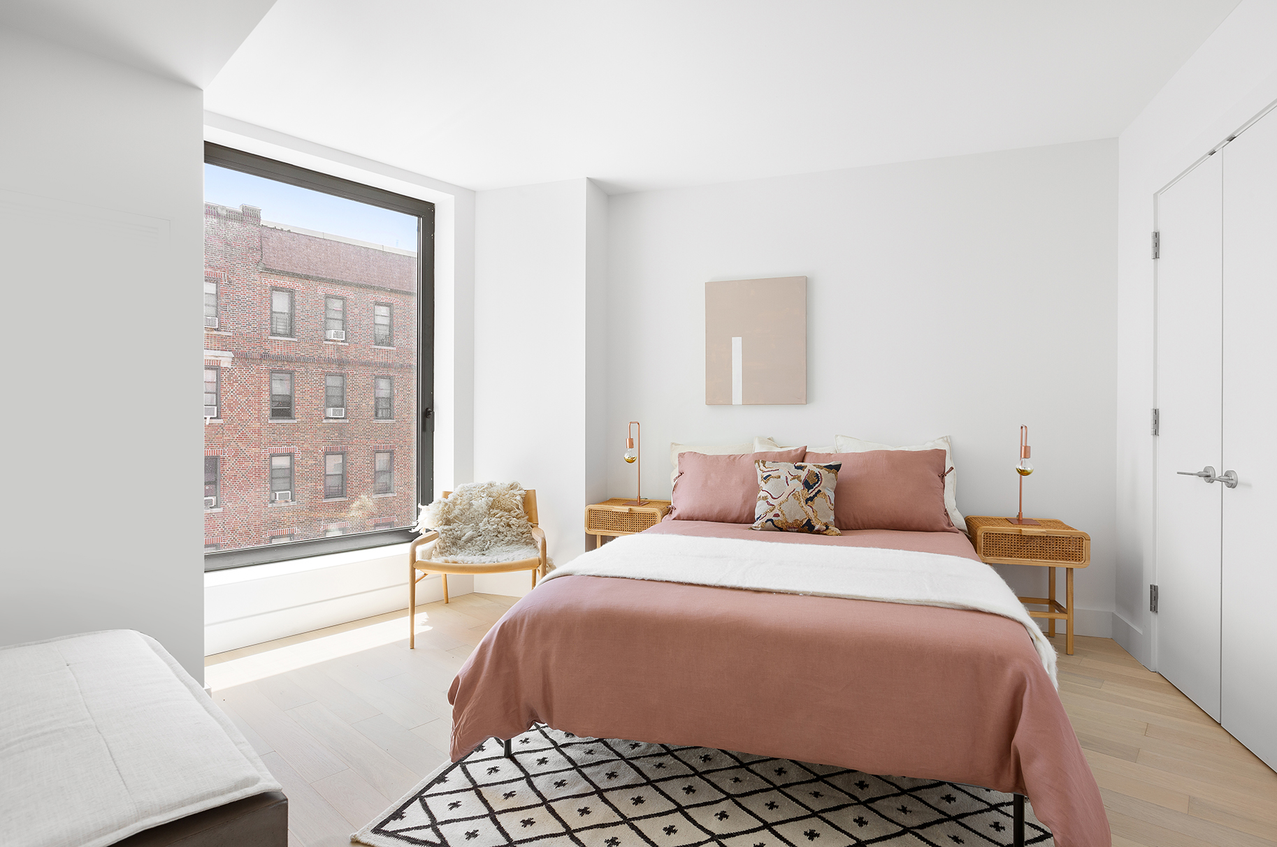 111 Montgomery Street, Unit 6K Brooklyn, NY 11225 - Photo 4 of 13 a bedroom with a bed and wooden floor