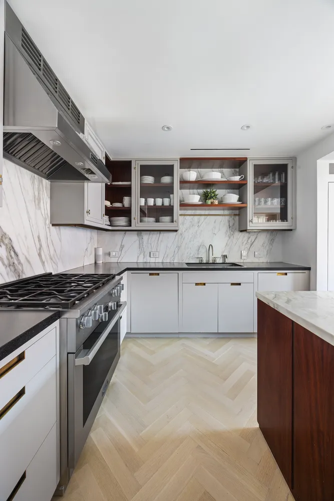 a dining room with furniture and windows