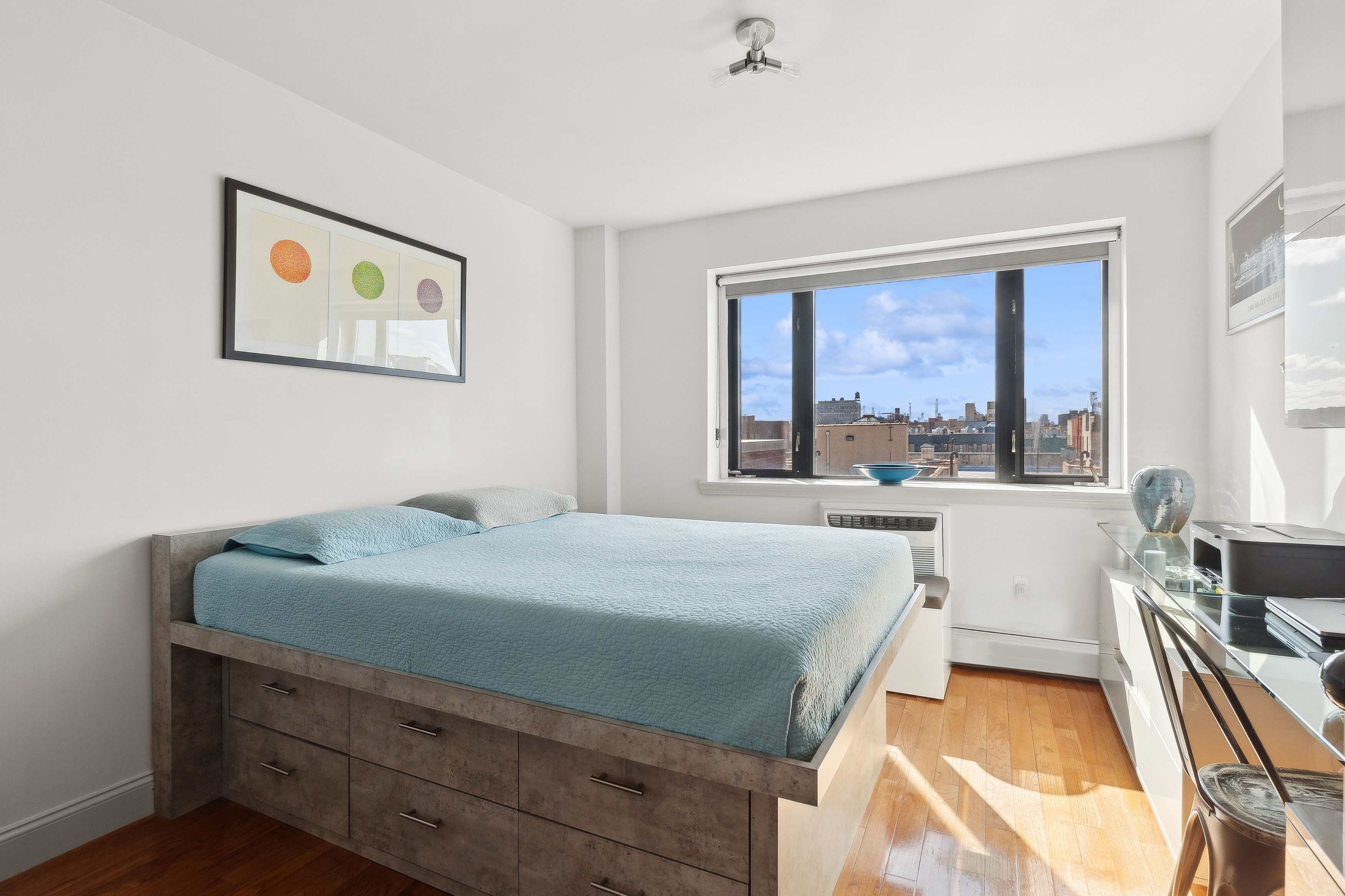456 West 167th Street, Unit 7C Manhattan, NY 10032 - Photo 8 of 16 a bedroom with a bed and a large window
